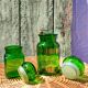 Duo of pots and jars apothecary style in green glass.