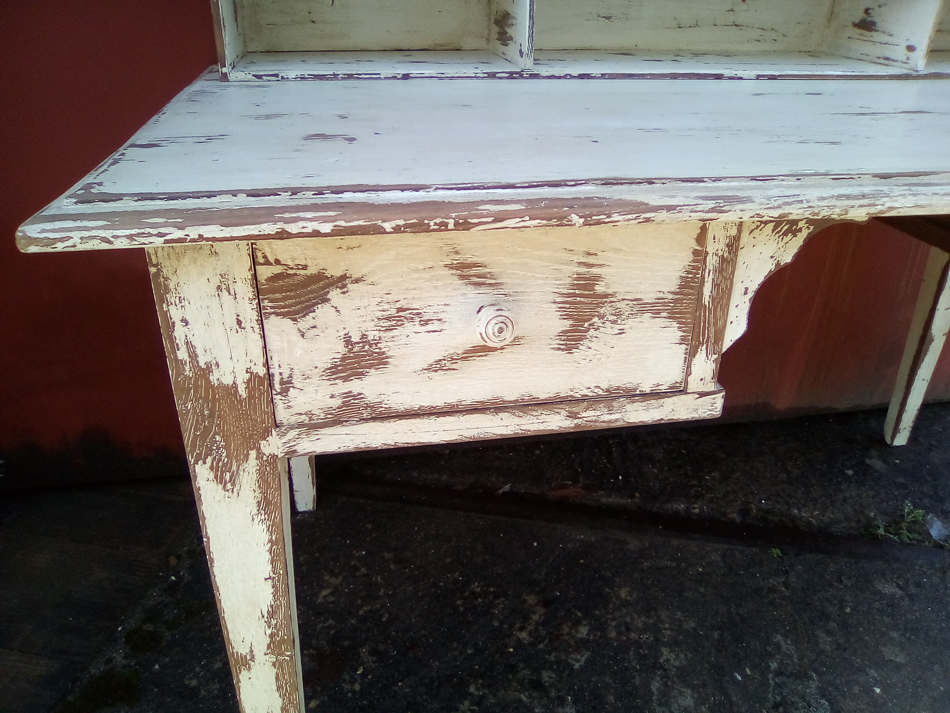 Large wooden desk with patinated bleacher