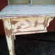 Large wooden desk with patinated bleacher