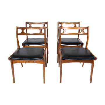 A set of four dining room chairs of teak of danish design, 1960s