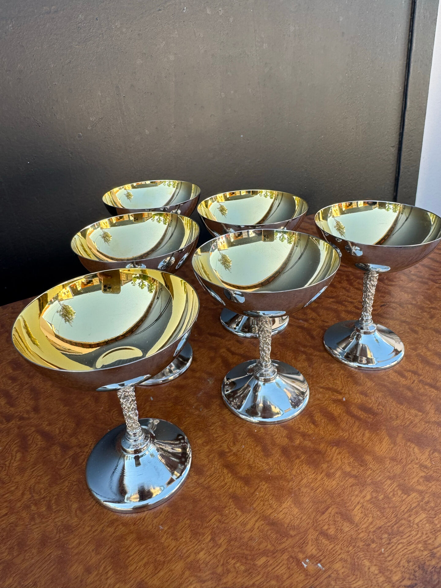 Silver-plated metal wine glasses on stems from the 1970s.