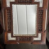 Oriental mirror in carved and turned wood inlaid with mother-of-pearl H 44/L 38 cm