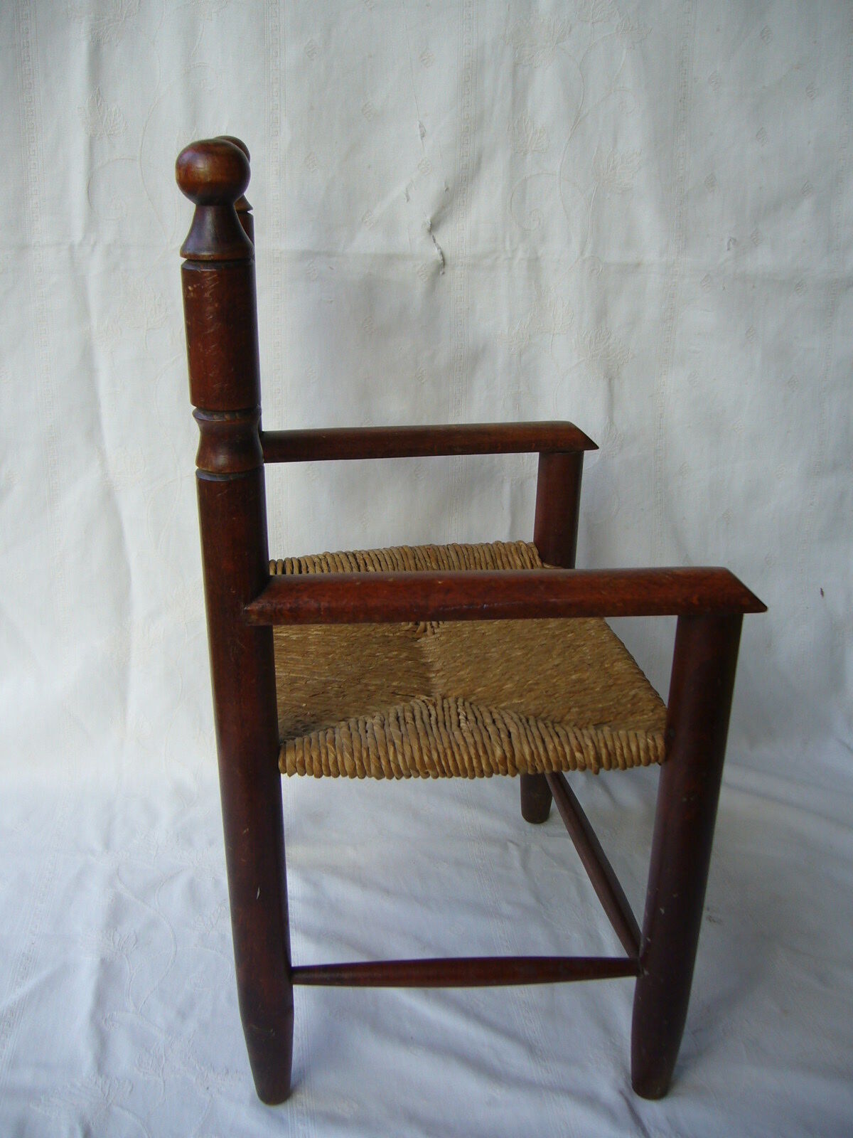 Wooden child's chair and mulched seat