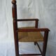 Wooden child's chair and mulched seat