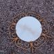 Golden metal sun mirror from the 1950s.