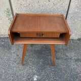 Bedside table with compass feet