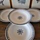 4 assiettes creuses Saint Amand, service Primax en terre de fer bleue, début 1900