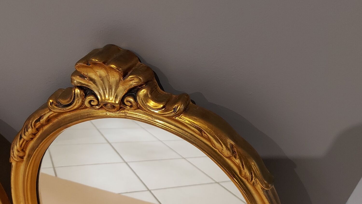 Paire de miroirs oval  doré vintage