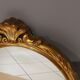 Paire de miroirs oval  doré vintage