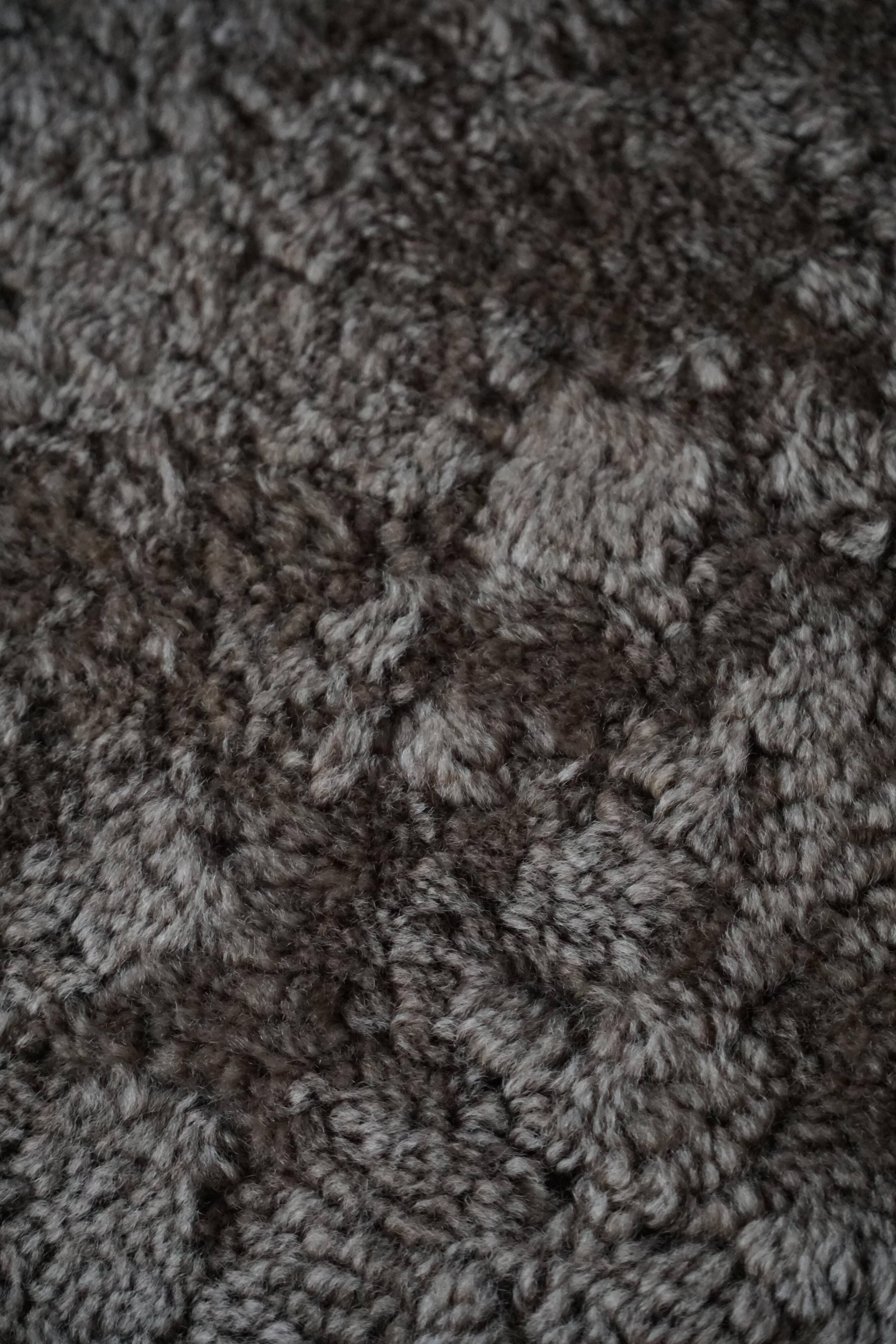 Razorblade armchair from the mid-20th century by Henning Kjærnulf, oak and lambswool, 1960.