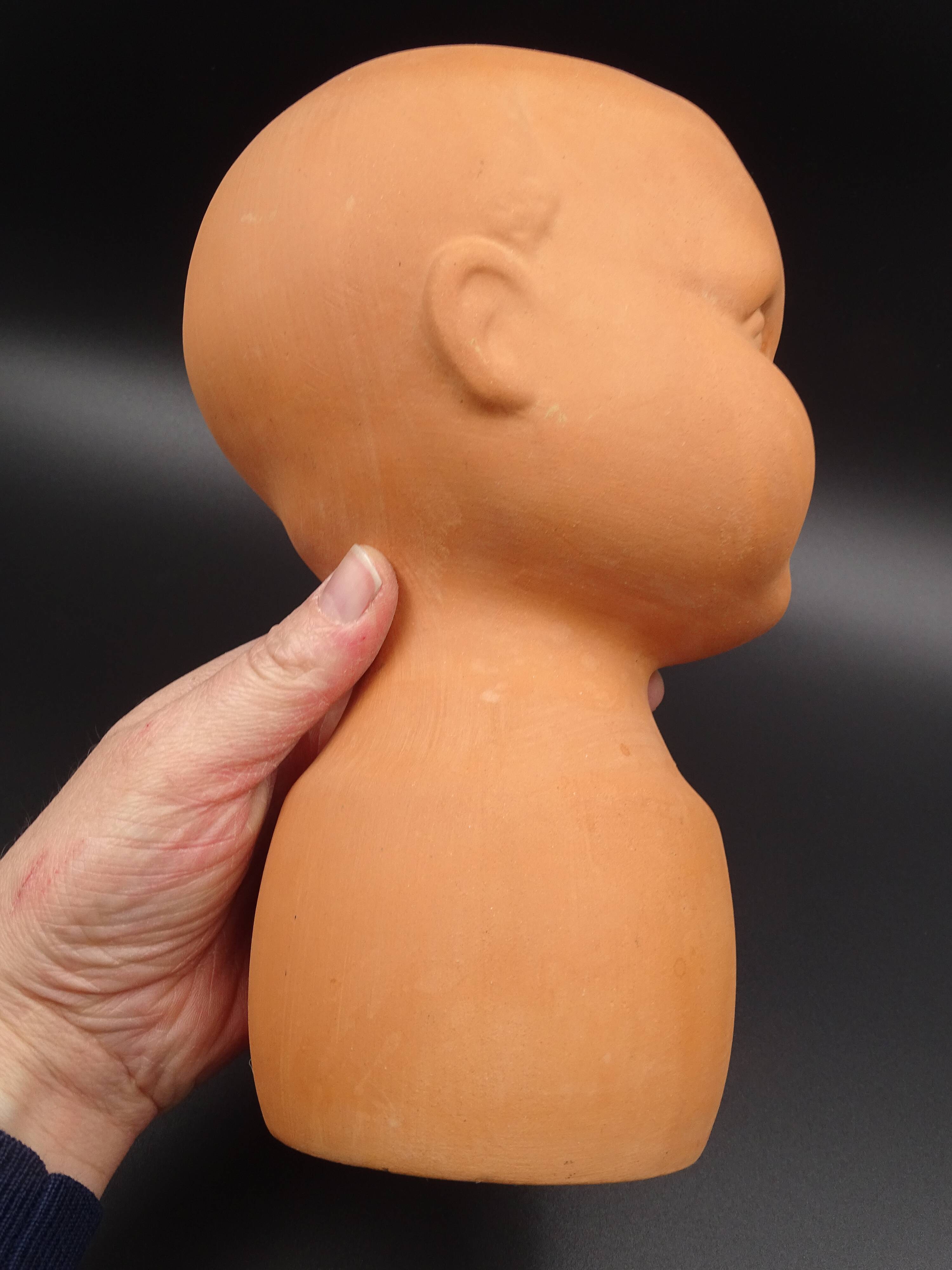 Vase in the shape of a baby's head - poupon