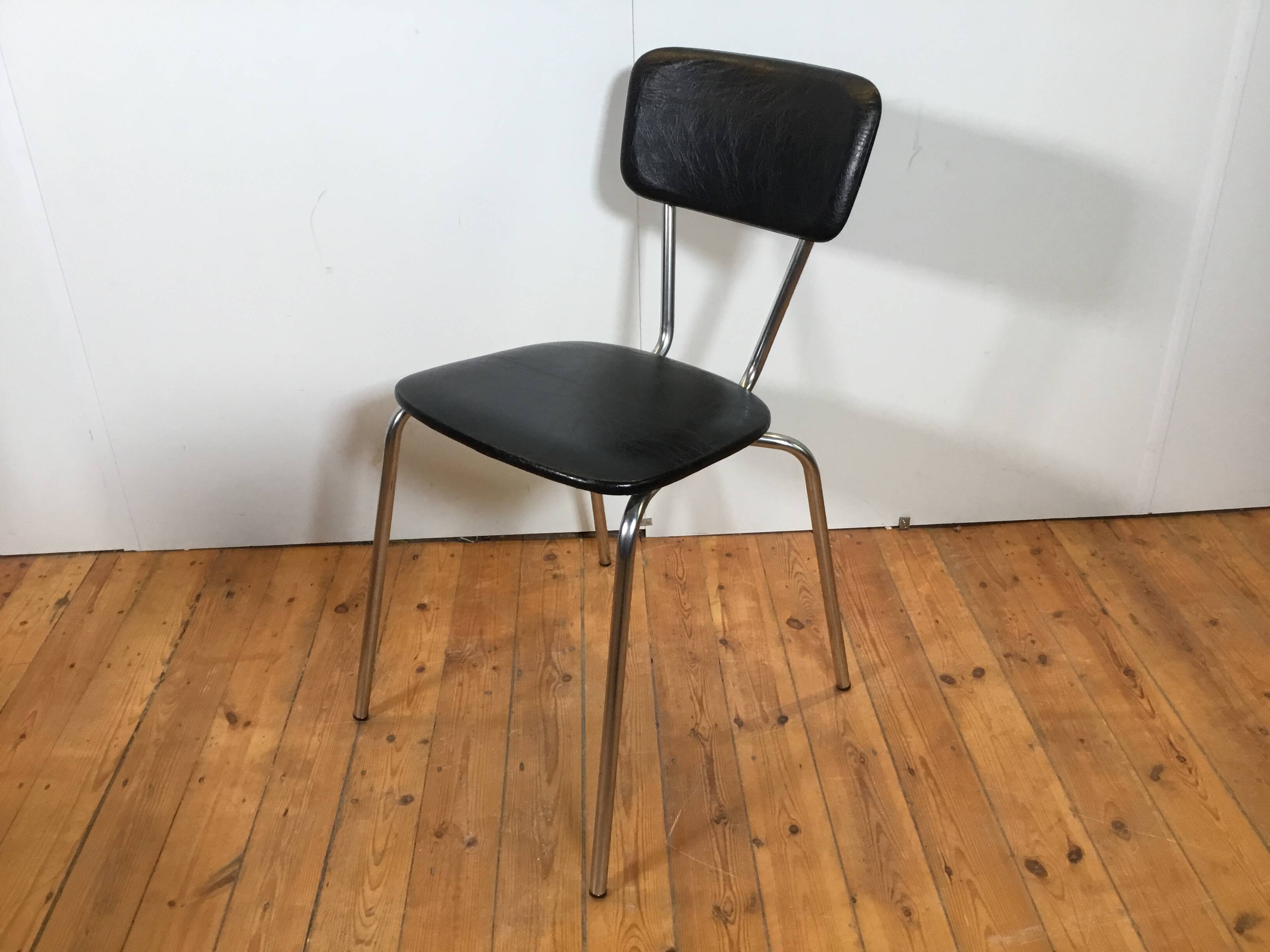 vintage chromed tubular steel stackable dining chairs