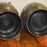 Asian vases in partitioned bronze