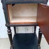 Romantic black bedside table with patinated marble and wood