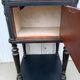 Romantic black bedside table with patinated marble and wood