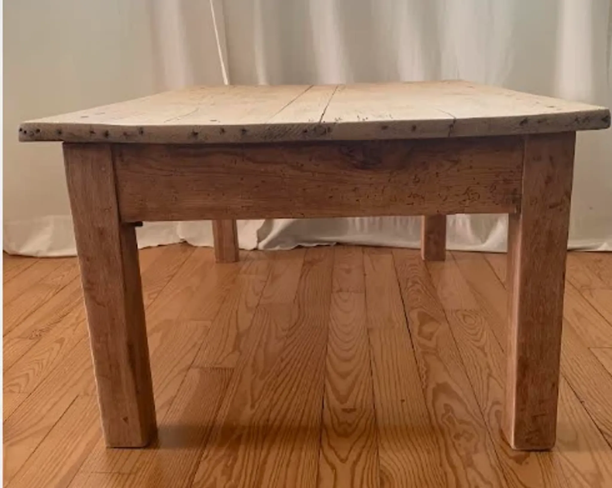 antique wooden coffee table with a patina