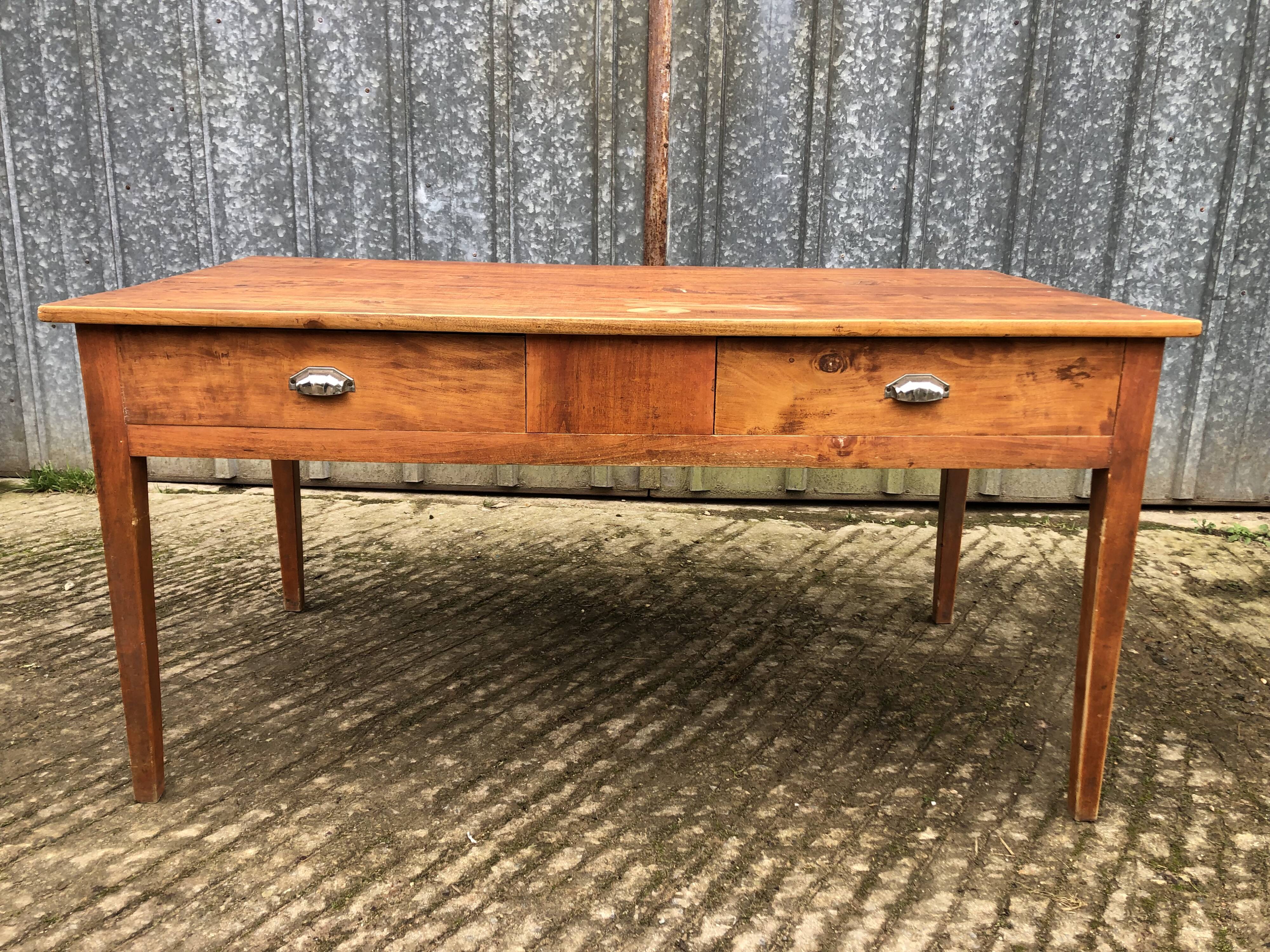 Poplar wood table with 2 front drawers from the Reconstruction period.