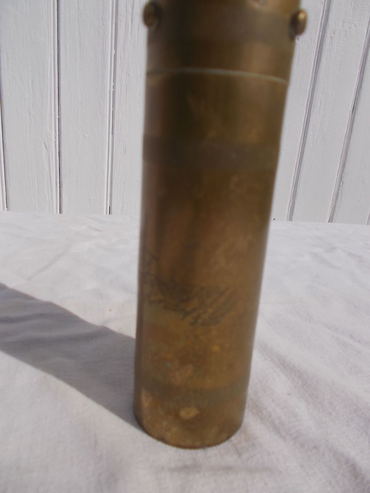 Oriental brass pepper mill