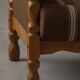 Modern Danish, a pair of lounge chairs in oak and wool, Henning Kjærnulf, 1960s.
