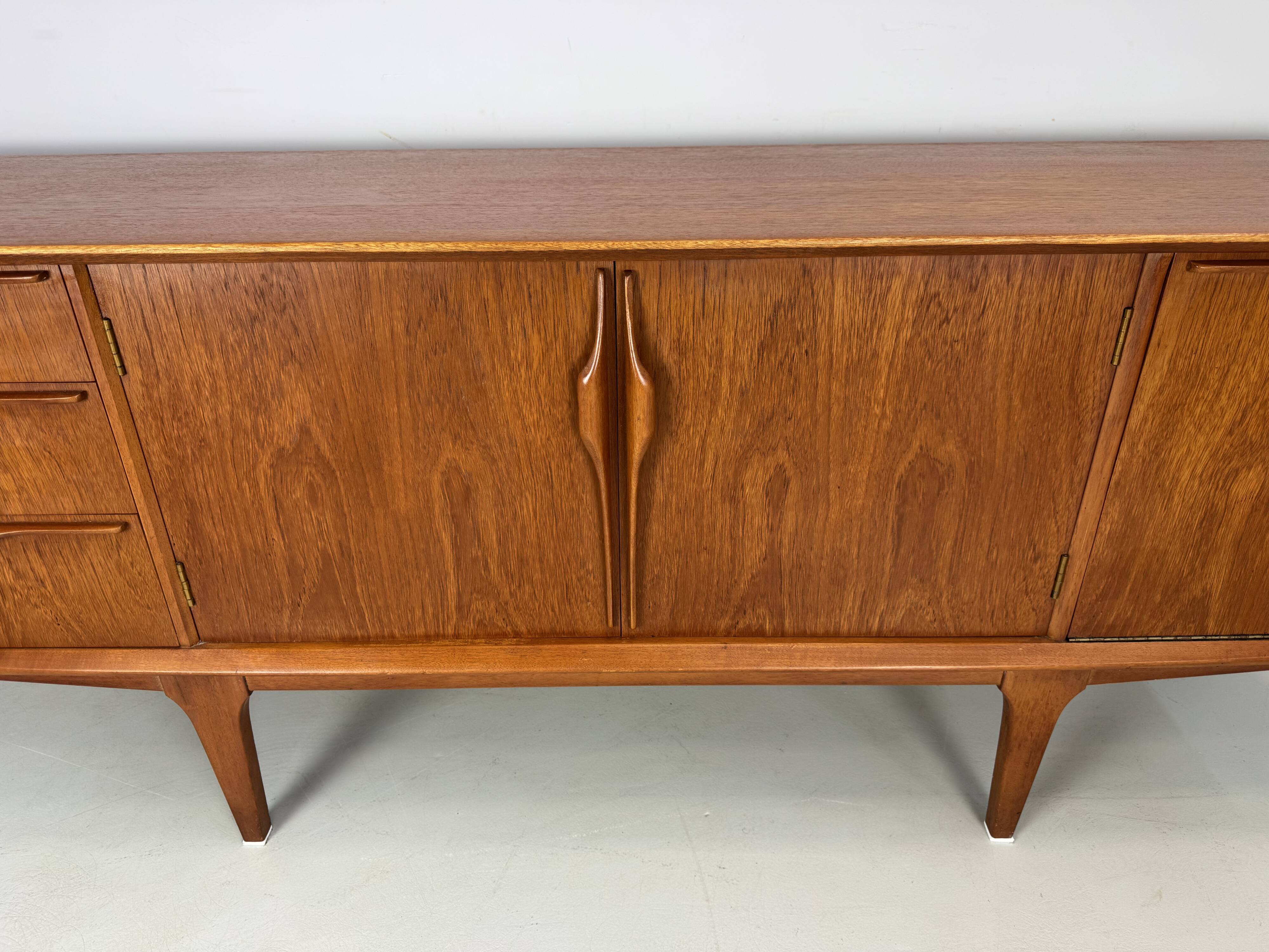 Vintage sideboard by Jentique from the 1960s .