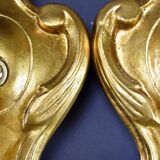 Pair of walled carved wood wall lamps