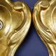 Pair of walled carved wood wall lamps