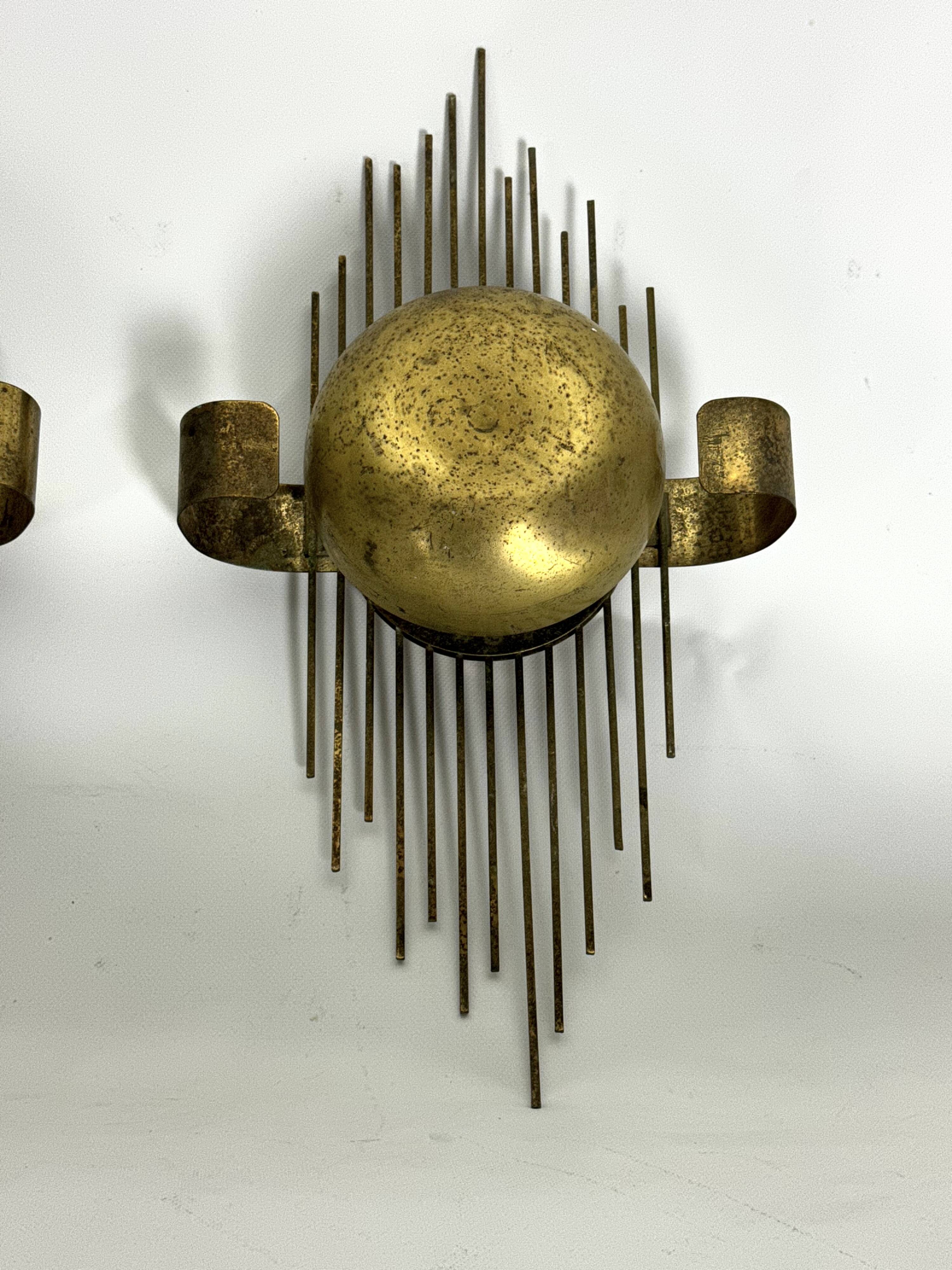 Mid-Century Set of three gilded metal sconces. Italy 1950s