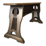 Art and Crafts style organ bench in solid oak.