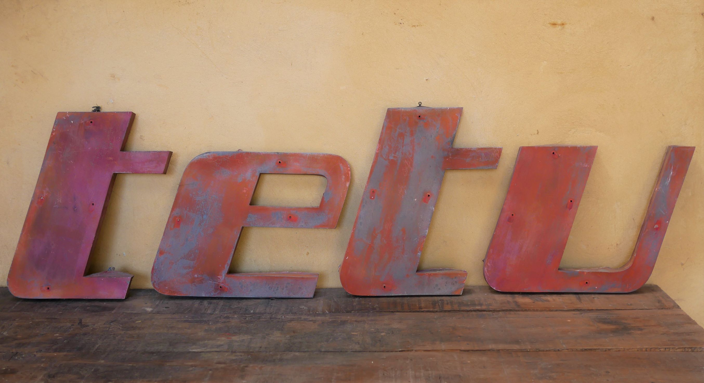 Letter to sign vintage metal "T".