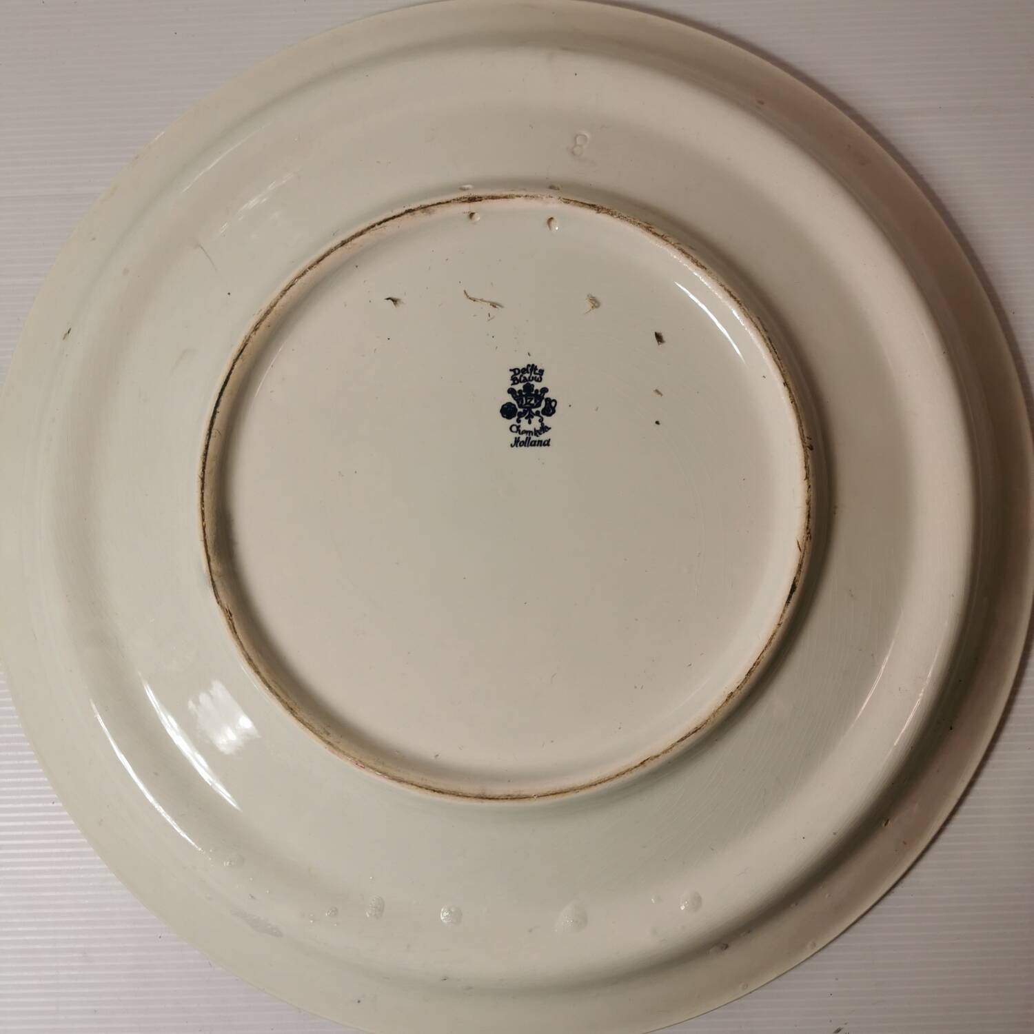 Delft earthenware dish decorated with a mill late 19th early 20th century diameter 39 cm