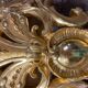 Golden wall applique with gold leaf