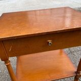 High bedside table in solid wood with drawers on casters