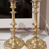 Pair of candle holders with punches
