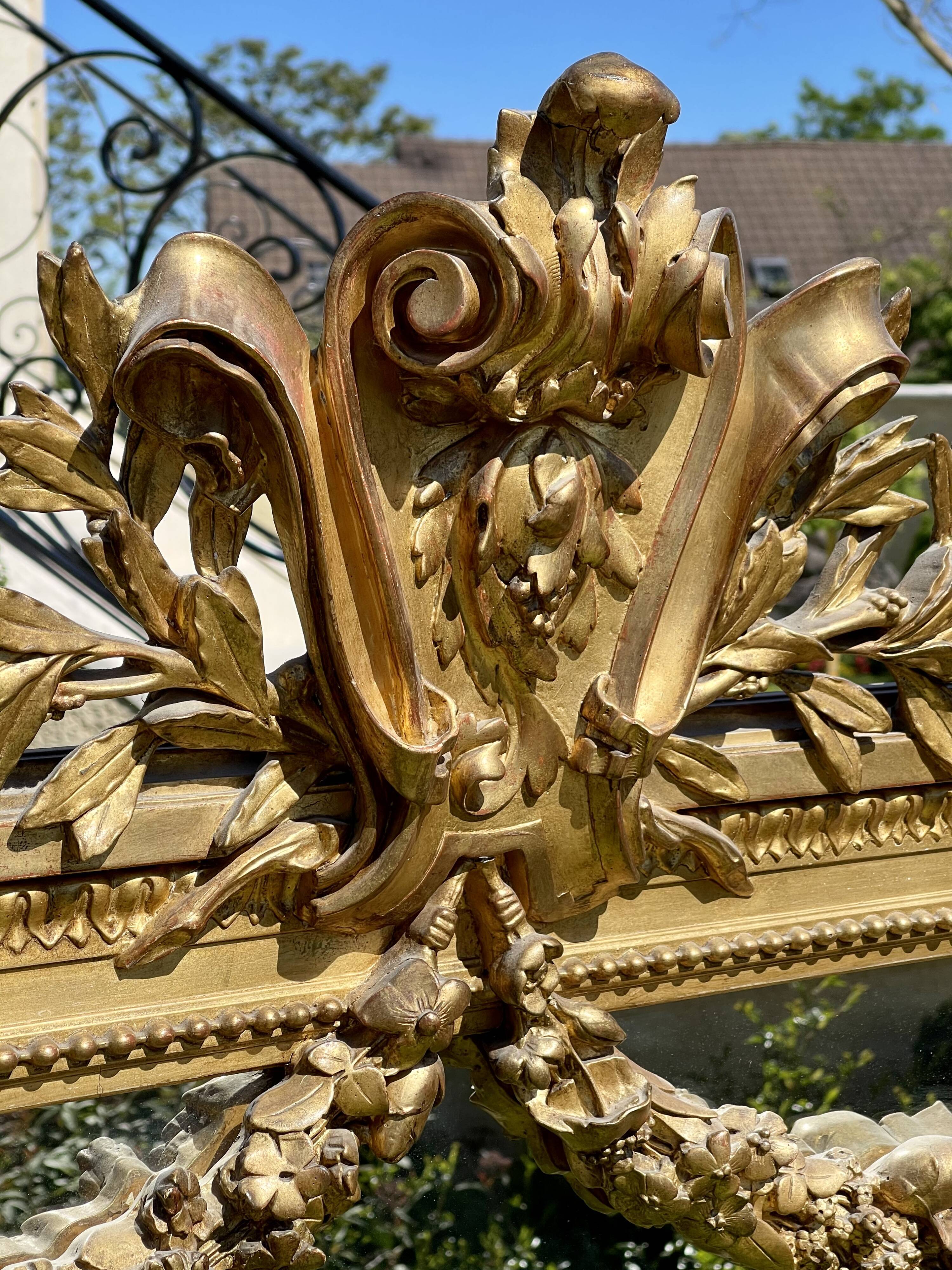 Gilded plaster mirror Louis XVl style