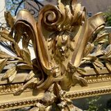 Gilded plaster mirror Louis XVl style