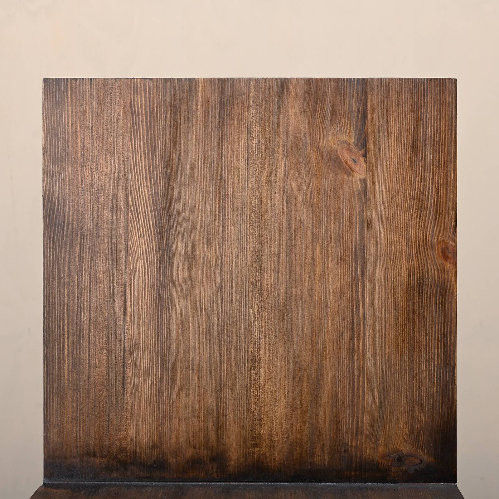 Gerrit Rietveld Zig Zag Chair is dark brown stained wood