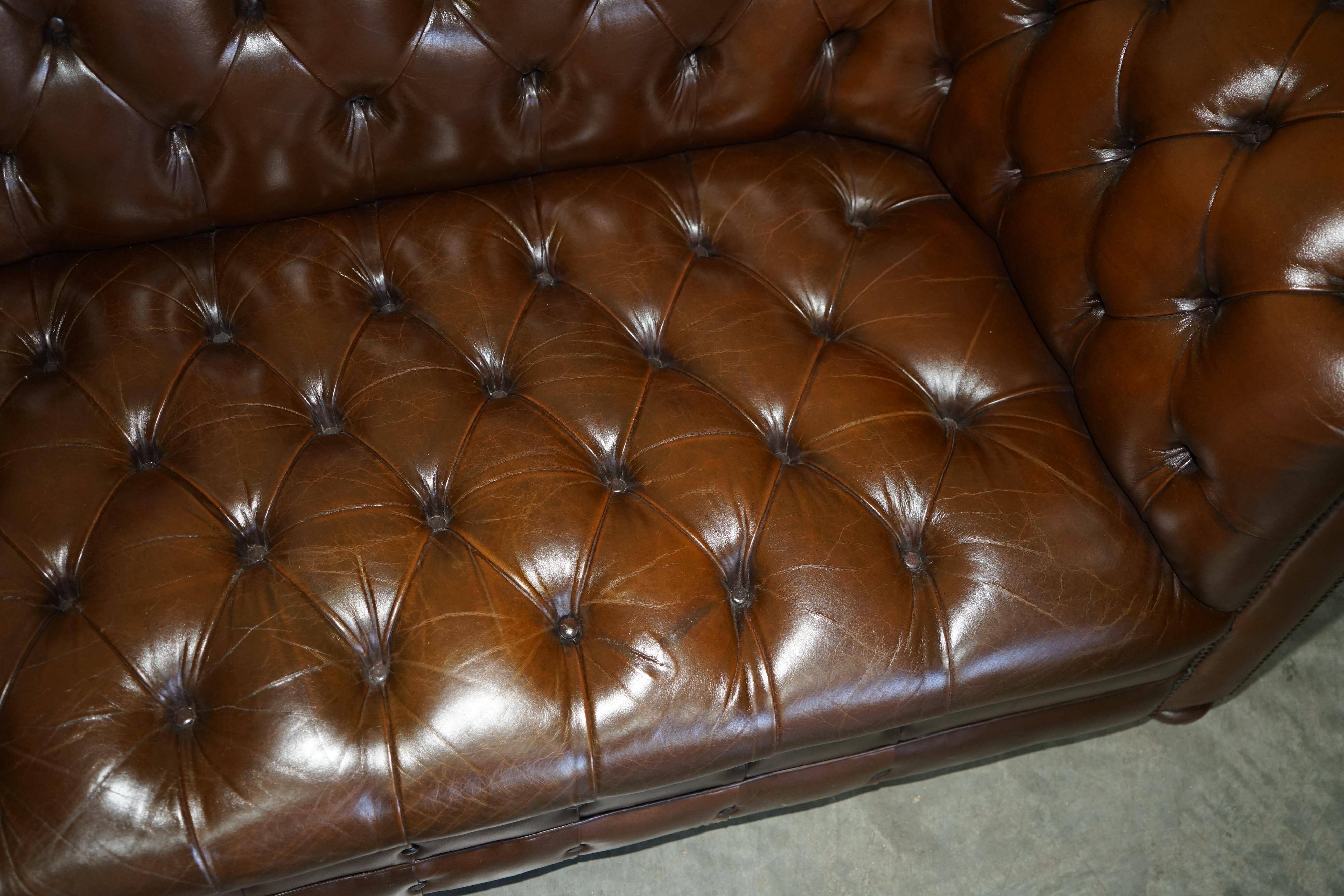 Restored Chesterfield leather sofa in vintage Art Deco style