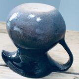 Pitcher in varnished sandstone