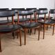 Set of 8 Danish chairs in teak, black leatherette and brass, Sven Chrobat/Sax.