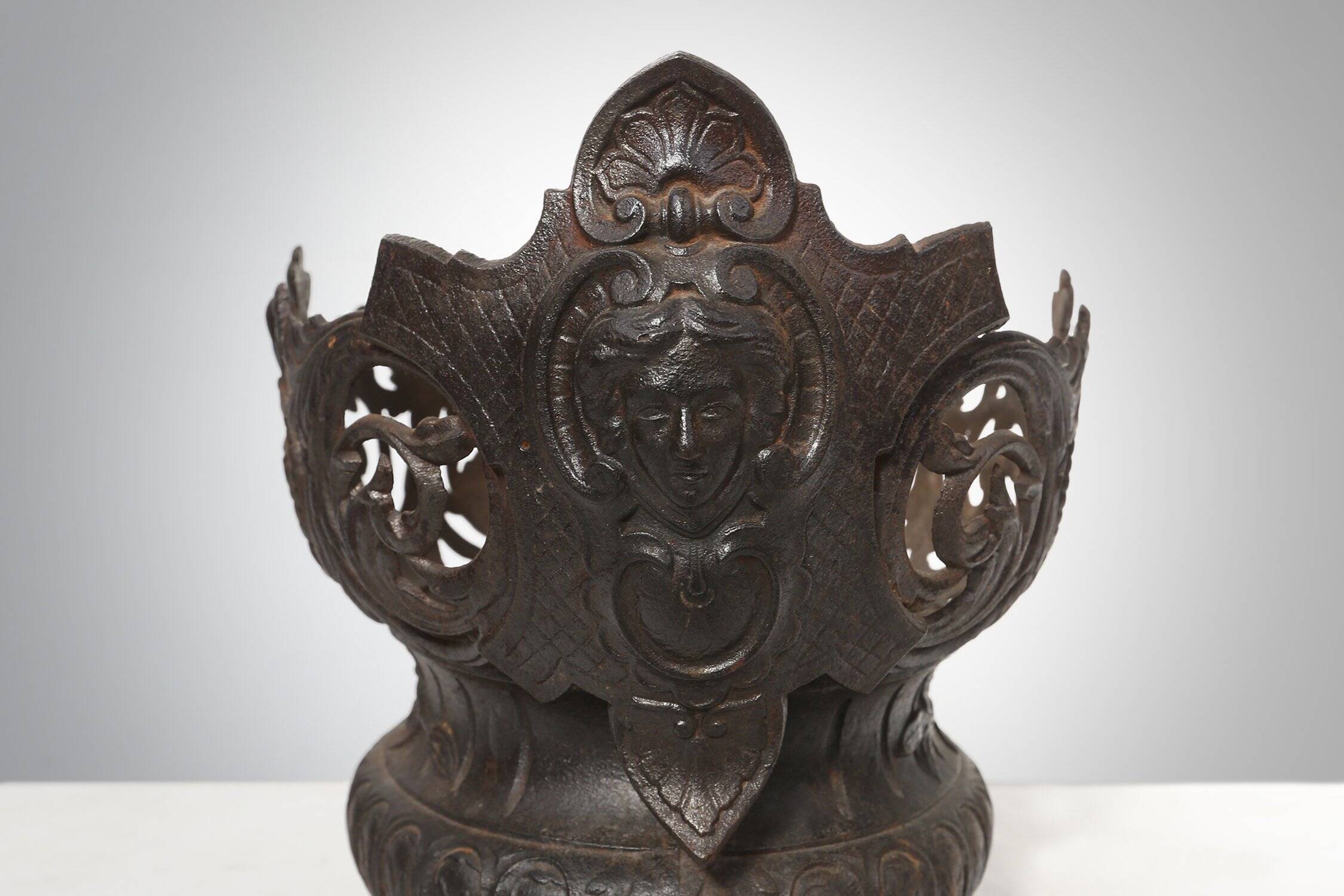 Cast Iron planter decorated with masks and lion paws, France 1850s