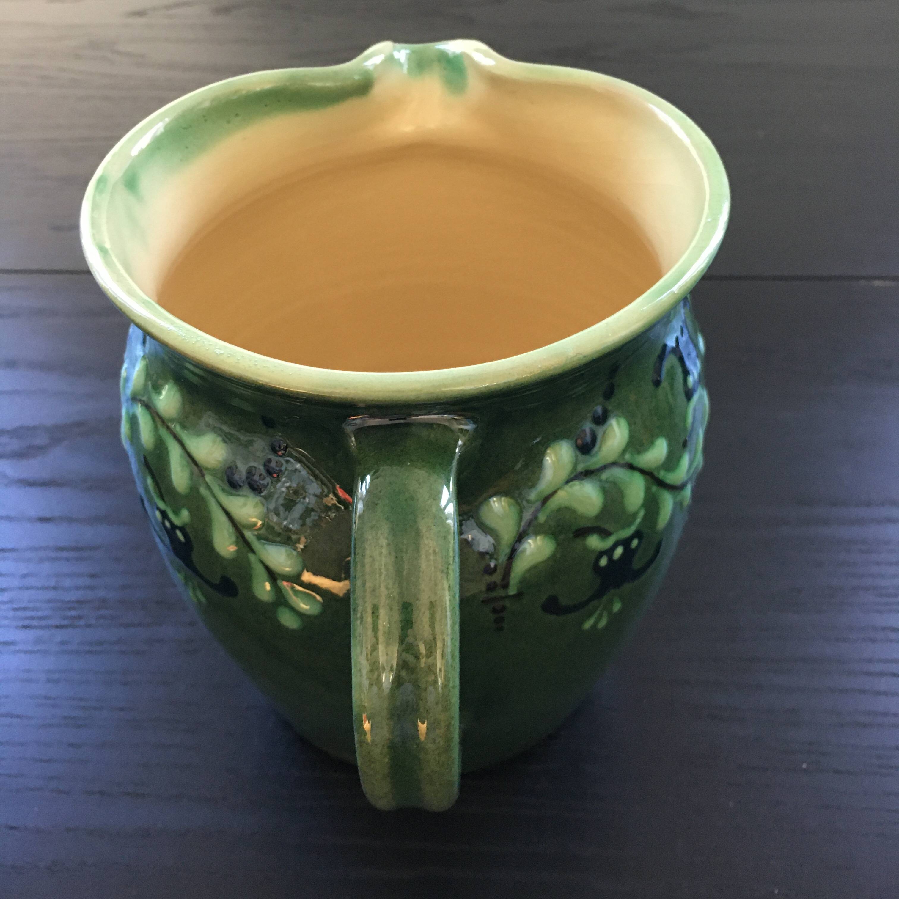 Large pitcher with floral decoration