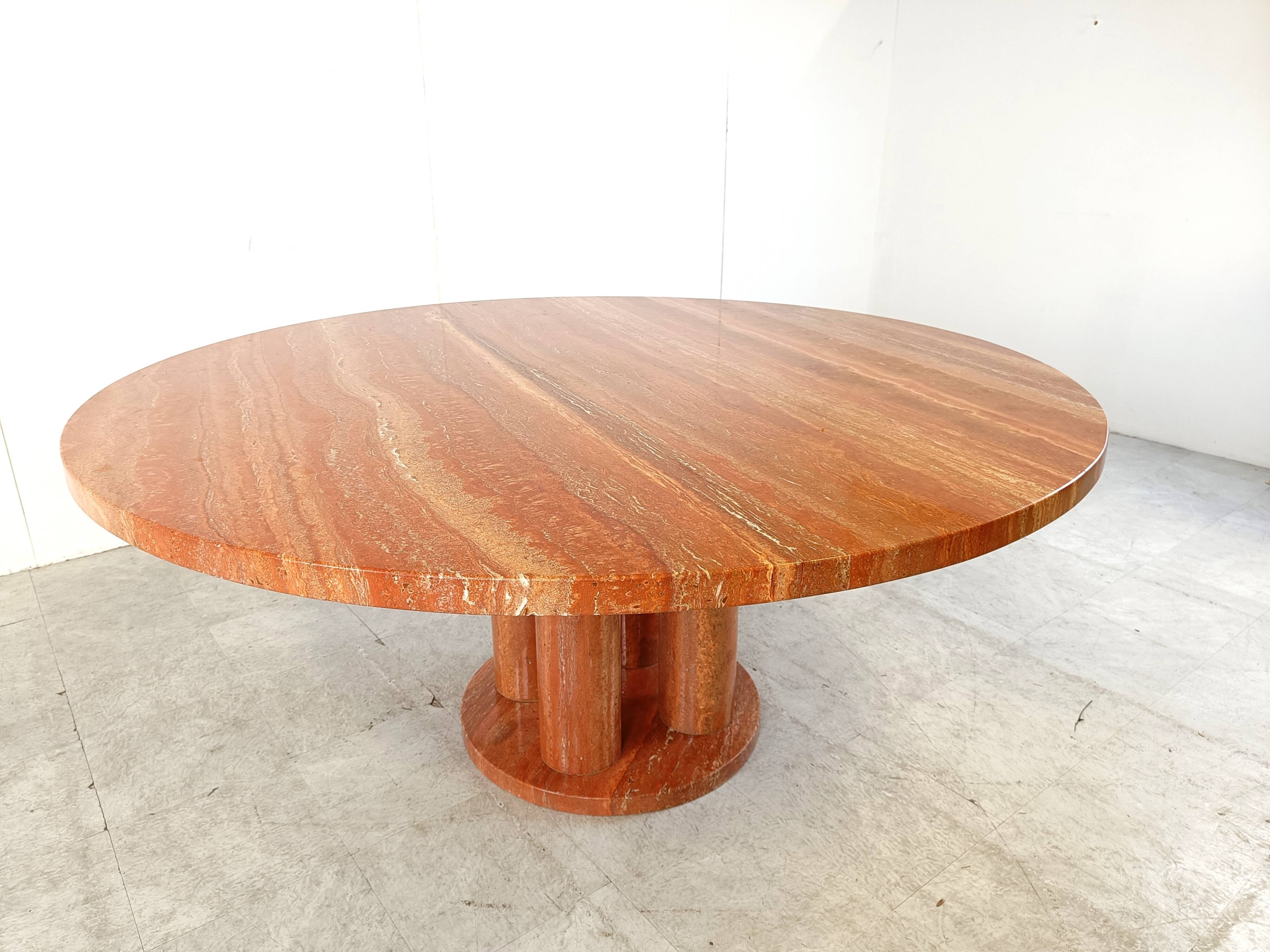 Large round red travertine dining table, 1970s
