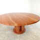 Large round red travertine dining table, 1970s