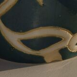 Blue water vase with white floral pattern