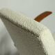 Fauteuil en bois et tissu bouclette beige clair restauré, design Puchala 1970