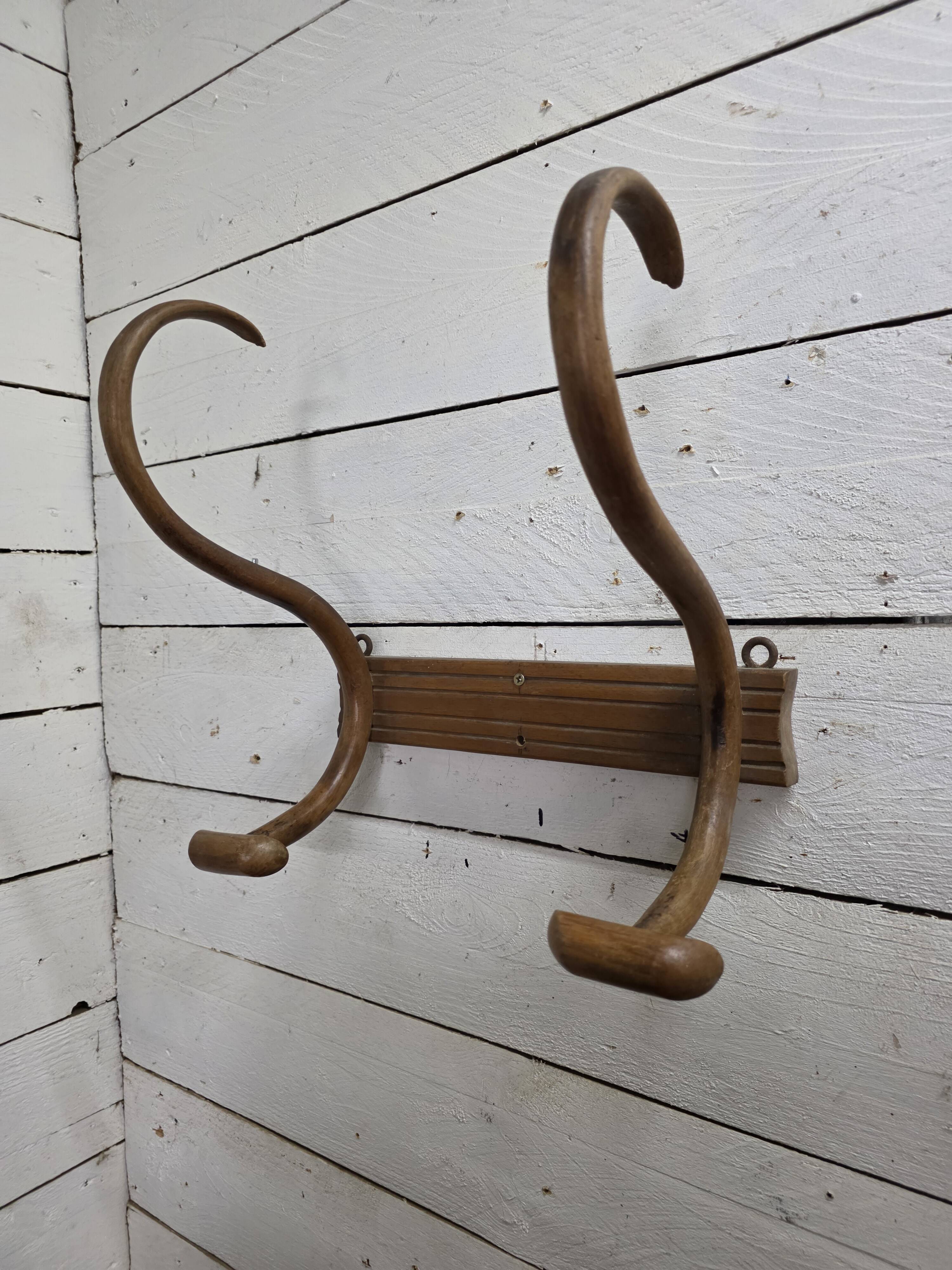Curved wooden coat rack with 2 hooks, 1920s.
