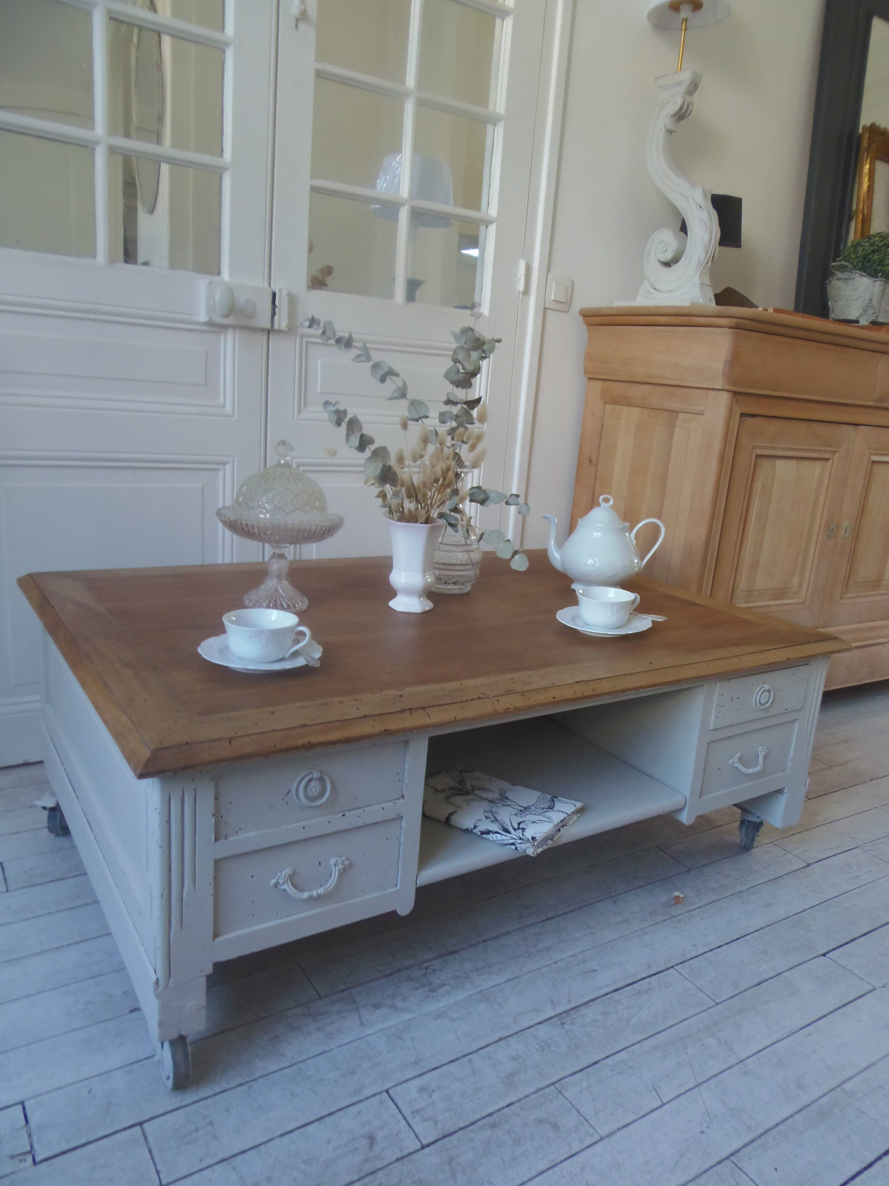 Coffee table on casters, made from an old desk, pearl gray base and belt.