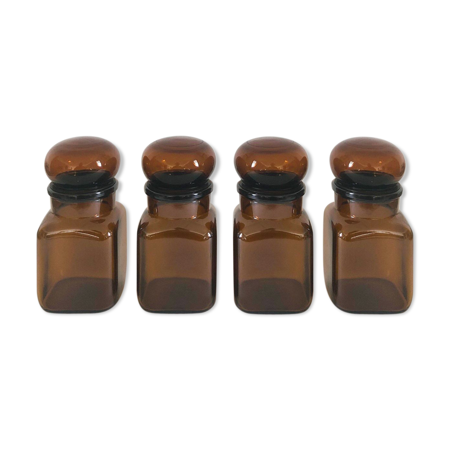 Lot of 4 bottles of amber glass apothecary style