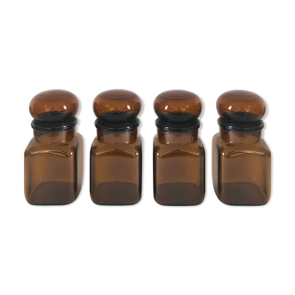 Lot of 4 bottles of amber glass apothecary style