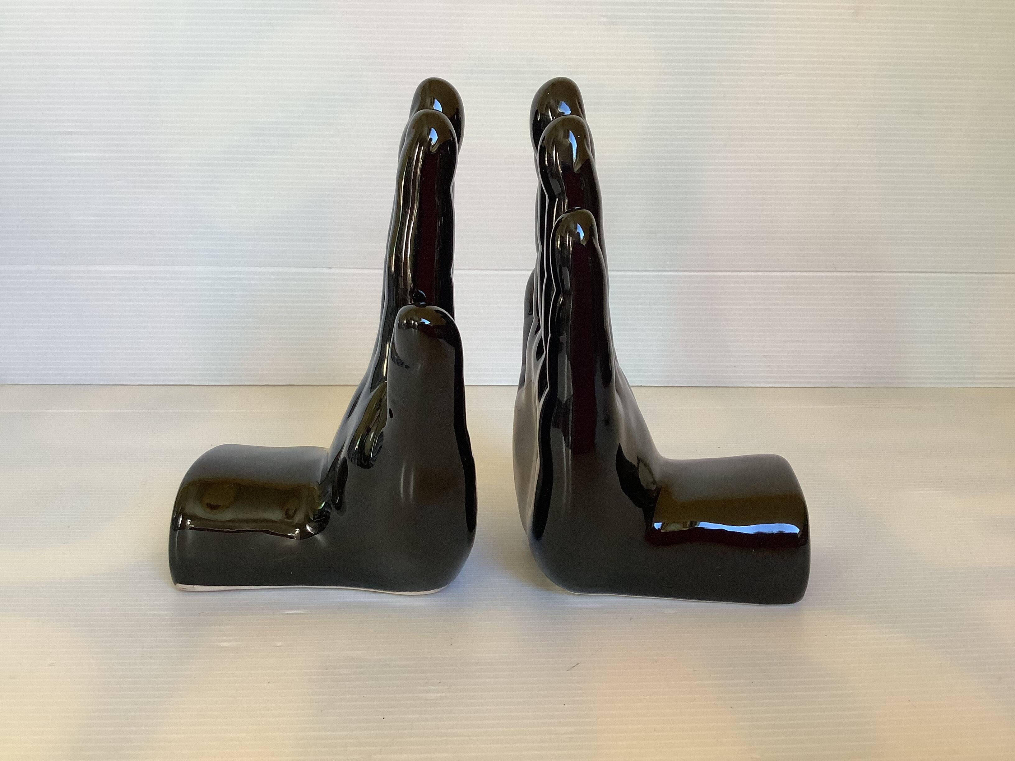 Pair of black hand bookends